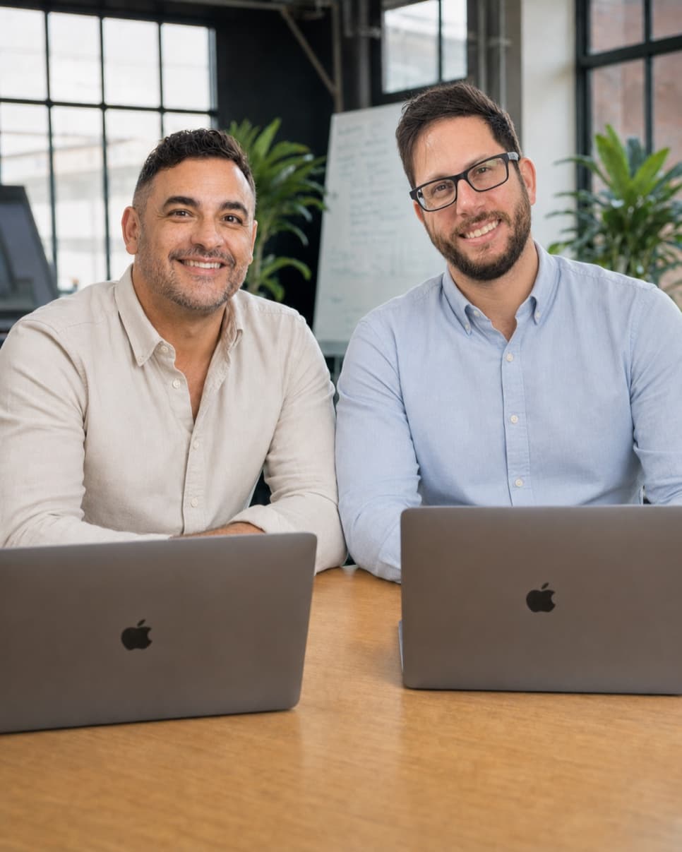 Nyvo's two co-founders at their desks.